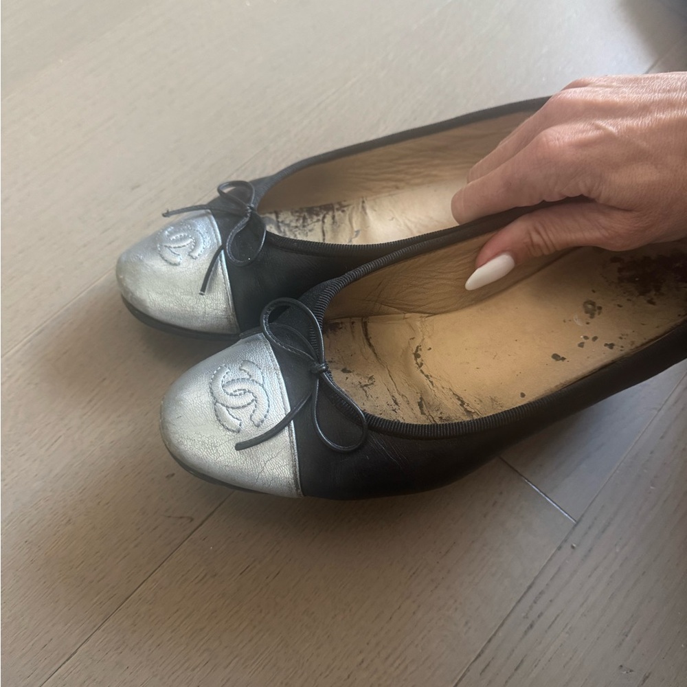 CHANEL Black Flats with Silver Cap Toe